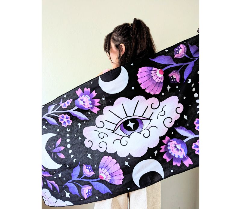 Mystic Moons Drape used as an altar cloth with lunar symbolism. Versatile Mystic Moons textile for altars, decor, or wearing. Available at Goddess Provisions.