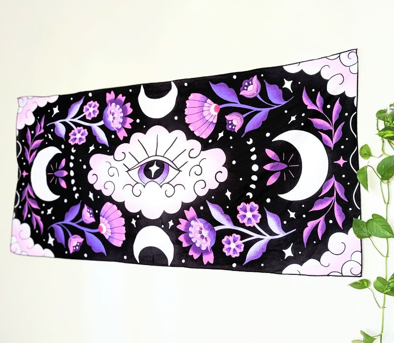 Mystic Moons Drape is used as an altar cloth for rituals. Versatile Mystic Moons textile for altars, decor, or wearing. Available at Goddess Provisions.