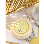 Sun Shower Steamer - Orange - Lemon - Ylang Ylang and Rosemary essential oil at Goddess Provisoins with leave background by Atma Botânica