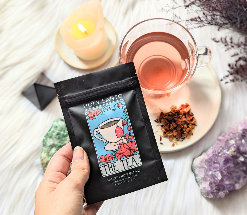 Tea Tarot Fruit Blend with crystals candles and tea packaging available at Goddess Provisions