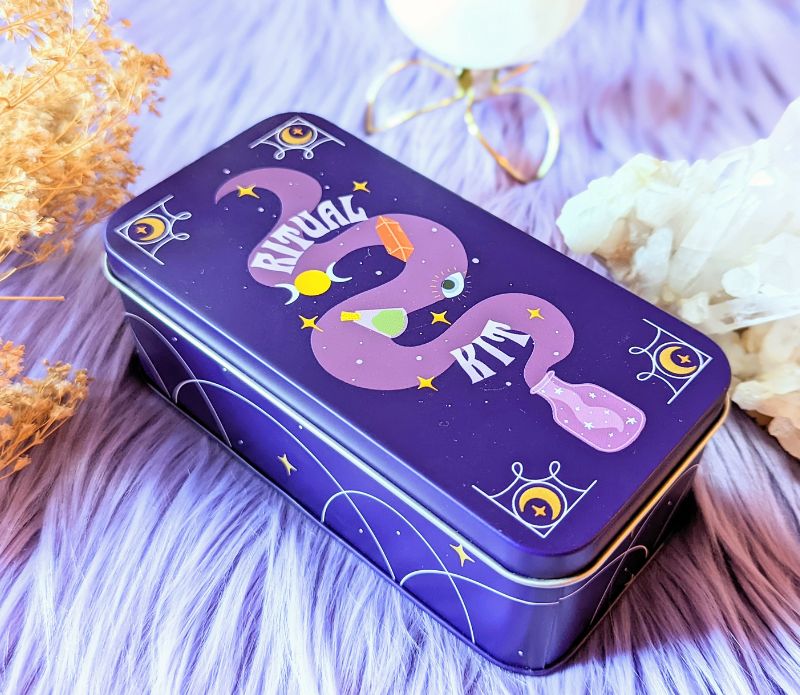 Elevate your spiritual practice with the portable Travel Ritual Kit. Includes brass tongs, glass vial, Smoky Quartz, and essential oil blend for on-the-go rituals. Available at Goddess Provisions.