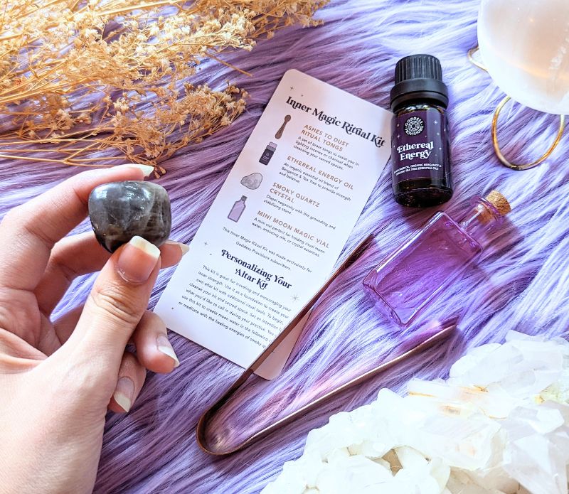 Elevate your spiritual practice with the portable Travel Ritual Kit. Includes brass tongs, glass vial, Smoky Quartz, and essential oil blend for on-the-go rituals. Available at Goddess Provisions.