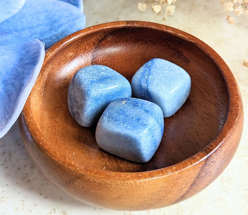 The tumbled Dumortierite is a high-vibration crystal for enhancing intuition, activating the third eye chakra, and connecting with higher realms. Available at Goddess Provisions.