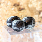 Ground your energy with Tumbled Hematite. This crystal connects to the root chakra, promoting balance and protection. Ideal for crystal healing and energetic stability. Available at Goddess Provisions.
