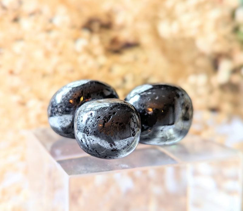 Ground your energy with Tumbled Hematite. This crystal connects to the root chakra, promoting balance and protection. Ideal for crystal healing and energetic stability. Available at Goddess Provisions.