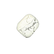 Experience tranquility with the tumbled White Howlite. This soothing crystal supports emotional balance, patience, and spiritual growth, perfect for meditation and healing rituals. Available at Goddess Provisions.