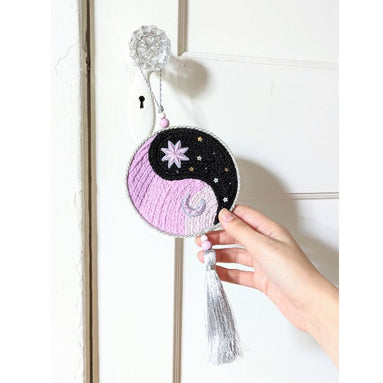 The Yin Yang Decorative Hanger is perfect for bedroom doors, drawer handles, or as wall decor. Available at Goddess Provisions