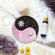 The Yin Yang Decorative Hanger is perfect for bedroom doors, drawer handles, or as wall decor. Available at Goddess Provisions