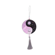 The Yin Yang Decorative Hanger is perfect for bedroom doors, drawer handles, or as wall decor. Available at Goddess Provisions