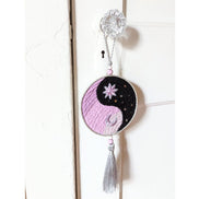 The Yin Yang Decorative Hanger is perfect for bedroom doors, drawer handles, or as wall decor. Available at Goddess Provisions