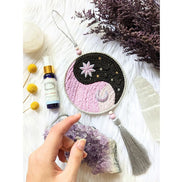 The Yin Yang Decorative Hanger is perfect for bedroom doors, drawer handles, or as wall decor. Available at Goddess Provisions