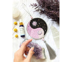 The Yin Yang Decorative Hanger is perfect for bedroom doors, drawer handles, or as wall decor. Available at Goddess Provisions