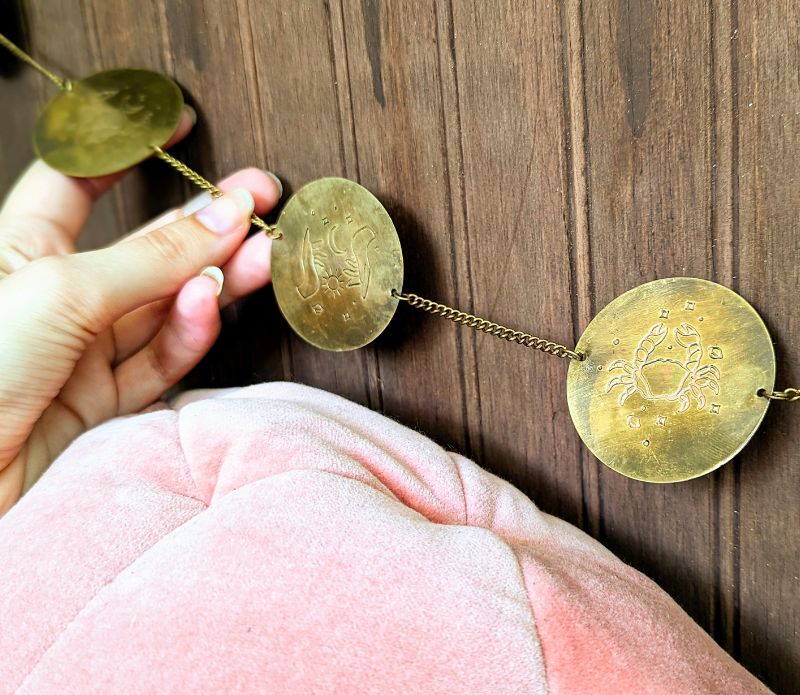 Discover the Zodiac Archetypes Wall Hanging, a celestial brass design showcasing all 12 zodiac signs. Perfect for altars, meditation spaces, or home decor, this astrology-inspired piece enhances your sacred space with star-guided wisdom. Available at Goddess Provisions