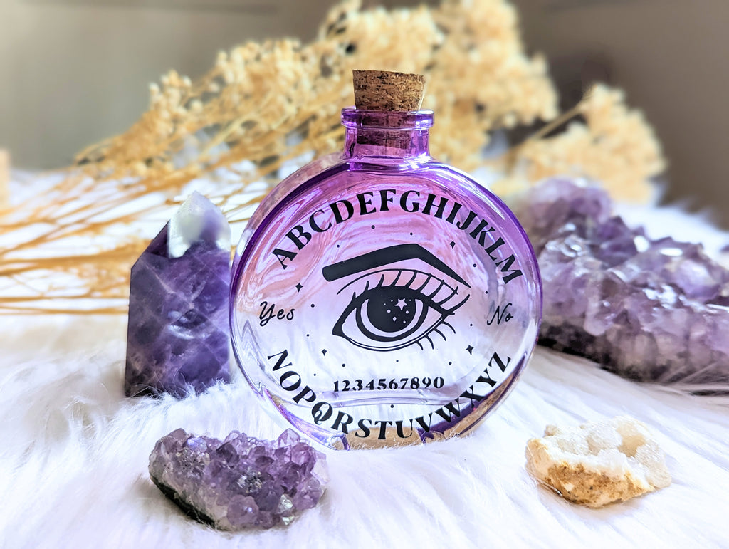 Cosmic Answers Glass Potion Bottle available at Goddess Provisions. Ideal for rituals, your altar, potions, and spellwork.