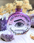 Cosmic Answers Glass Potion Bottle available at Goddess Provisions. Ideal for rituals, your altar, potions, and spellwork.
