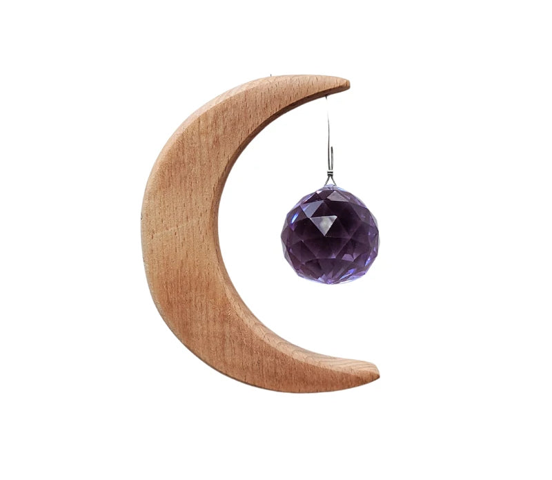Crescent Moon Rainbow Maker. Made of wood and crystal. Available at Goddess Provisions