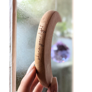 Crescent Moon Rainbow Maker. Made of wood and crystal. Available at Goddess Provisions