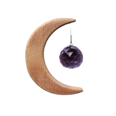 Crescent Moon Rainbow Maker. Made of wood and crystal. Available at Goddess Provisions