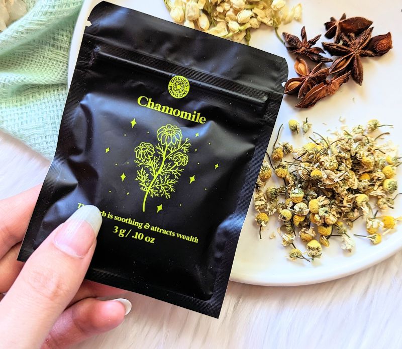 Attract abundance with the Money Magick Ritual Kit. Includes herbs, pyrite, and instructions for creating money bowls, jars, or prosperity rituals with chamomile. Available at Goddess Provisions.