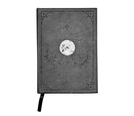 Mystical Musings Divination Diary showing a clear quartz crystal design surrounded by moon phases, ideal for amplifying dreams and manifestations.