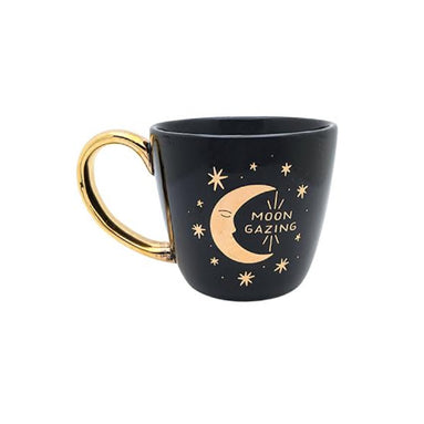 Black and celestial ceramic mug with moon and sun design available at Goddess Provisions