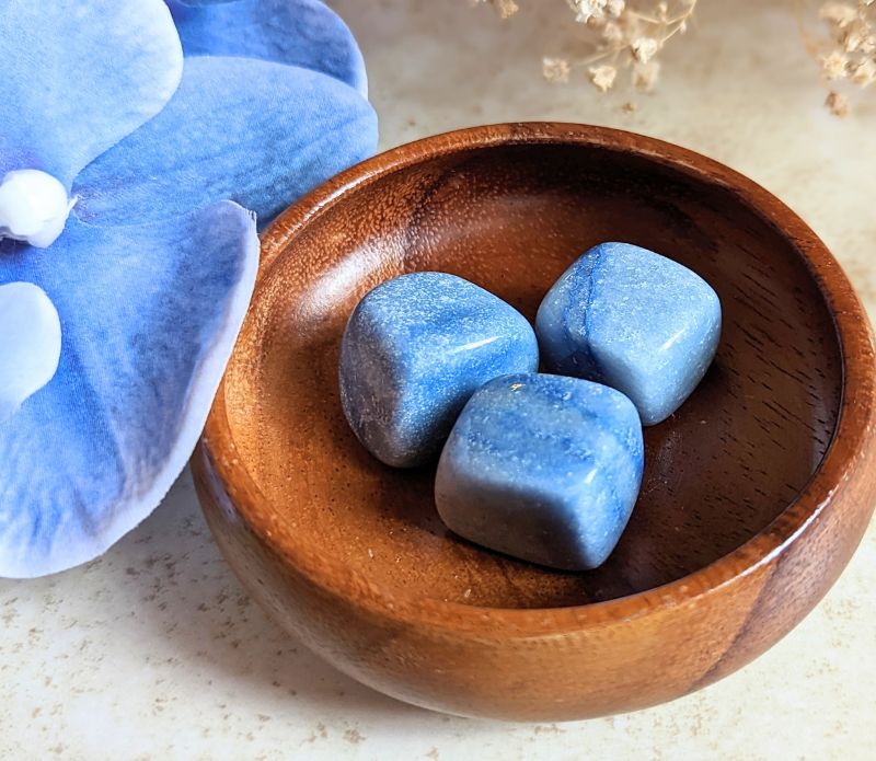 The tumbled Dumortierite is a high-vibration crystal for enhancing intuition, activating the third eye chakra, and connecting with higher realms. Available at Goddess Provisions.